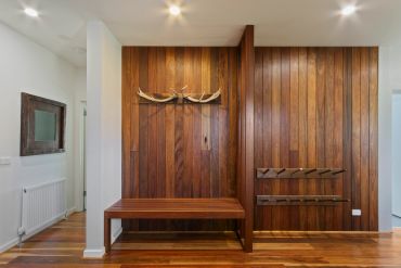 spotted gum wall panelling, handmade bench seat, down lights, spotted gum flooring