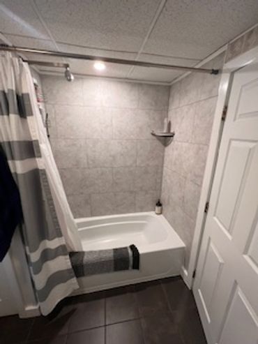 Maine Flow Tech Installed new Vinyl tiles on this shower walls.