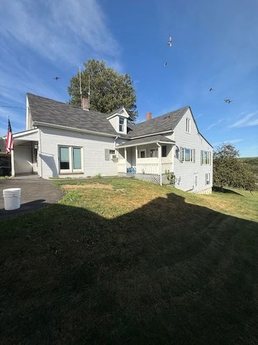 This home looks much better after Maine Flow Tech gave this home a good exterior house washing.