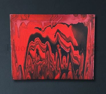 Acrylic pour artwork with flowing black, crimson, and dark wine red hues, resembling stalactites.