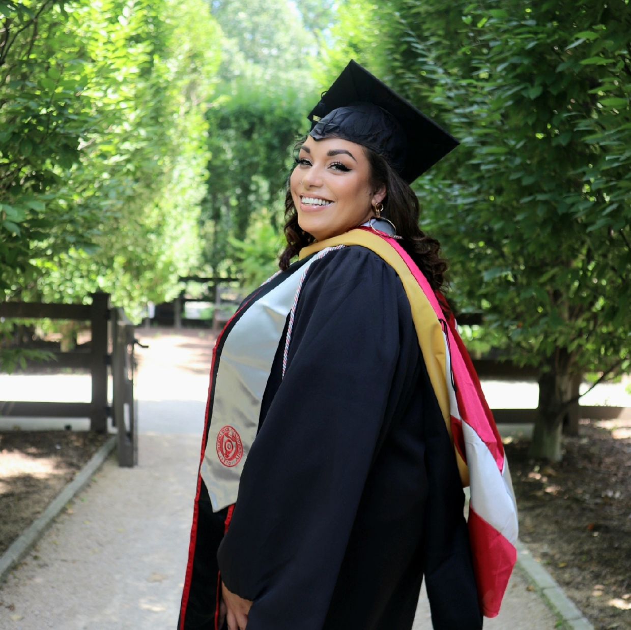 Graduation Photo to Celebrate Obtaining my MSW in 2022.