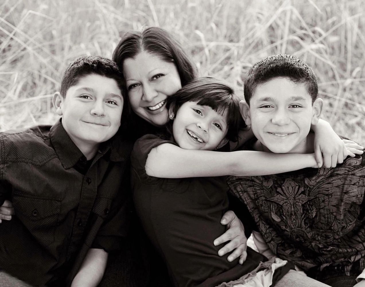 Delfina, founder of Be a Blessing with three of her children
