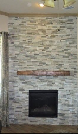 stone fireplace, hardwood flooring, lantana