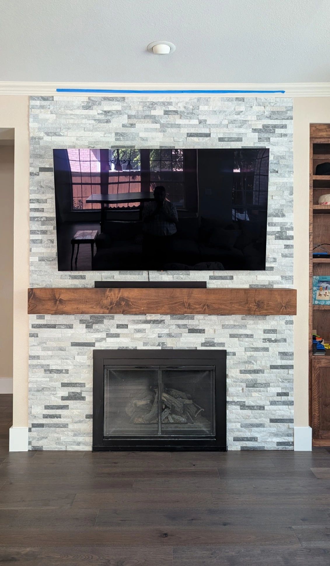 stone fireplace , hardwood all the way up the fireplace , new mantle , flower mound 