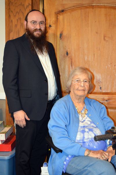 Local Chabad Rabbi Benjamin Shemtov and Auschwitz survivor Helga Melmed