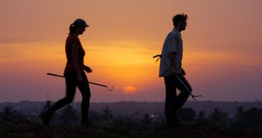 Matej and Zuzana working with snakes silhouette. Rhett Cutrell, Fornever Productions