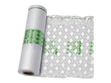 Roll of clear bubble wrap with green text on a white background.