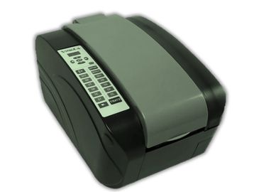 Compact thermal label printer with control panel on top.