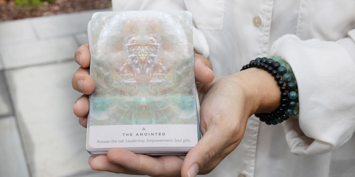 An oracle card reveals the significance of embracing