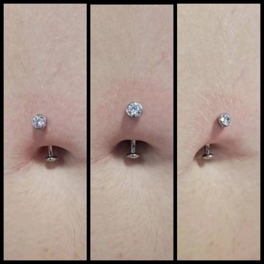 Close-up of a nose piercing with a sparkling gem stud.