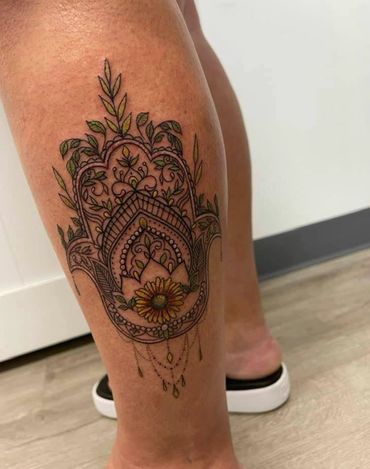 hamsa hand flower tattoo