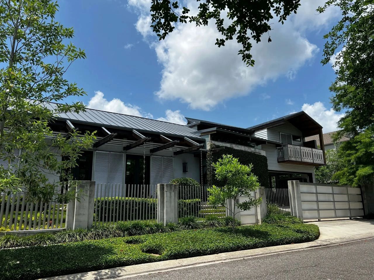 view of a property with trees outside 