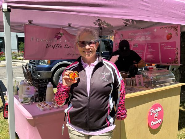 Lady in pink came by and found teh hidden glass heart at our booth! This was our first Thursday here