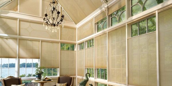 automated window blinds on lake view room