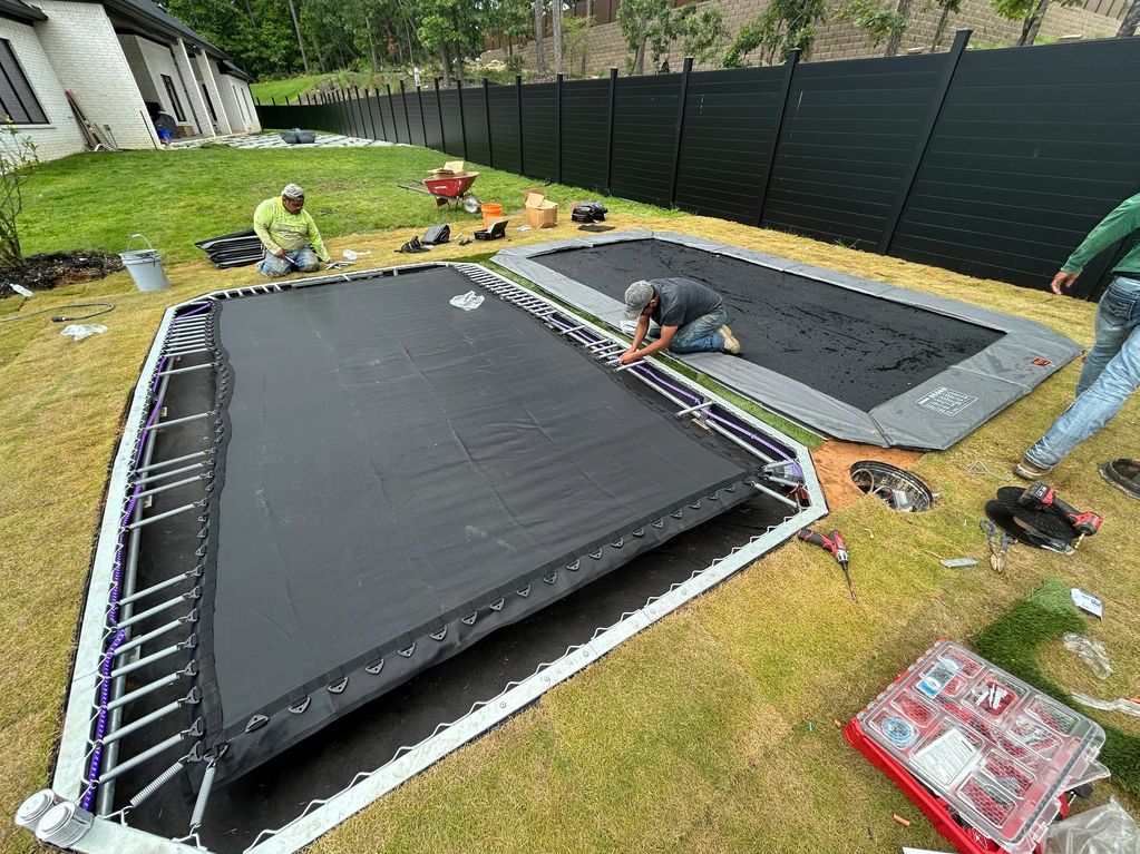 Ground level trampoline installation