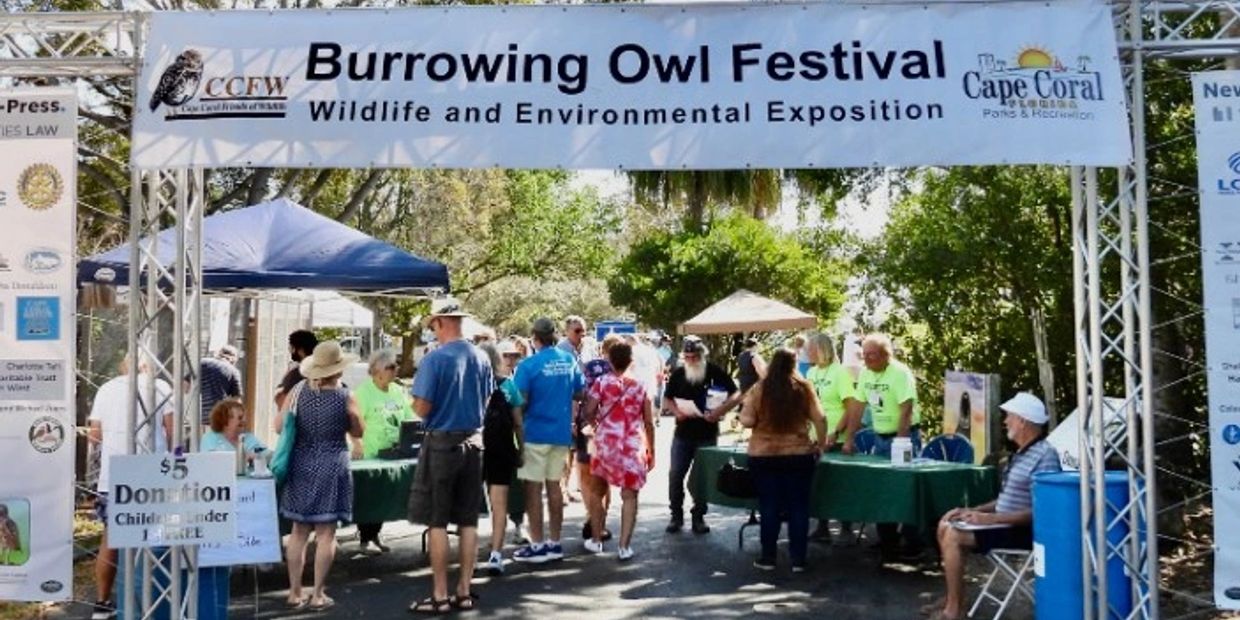 People at the Burrowing Owl Festival entrance.