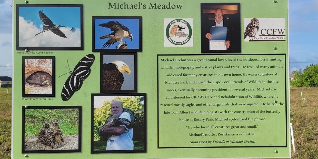 Informative sign about Michael Orchin and wildlife conservation.
