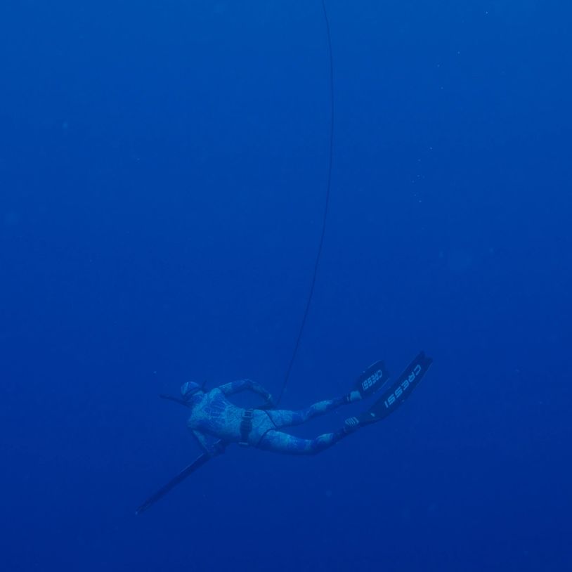 Free-Diving deep to spearfish a yellowfin tuna offshore of Jaco Costa Rica. 
