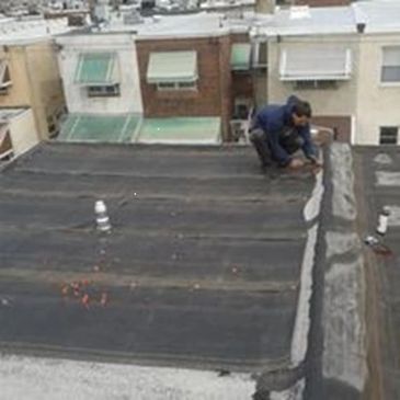 flat roof install and leak repair