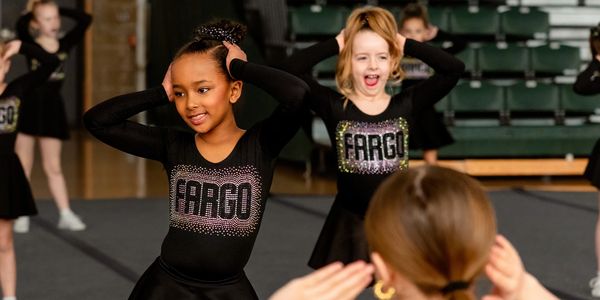 Fargo All Stars cheerleaders dancing at a performance