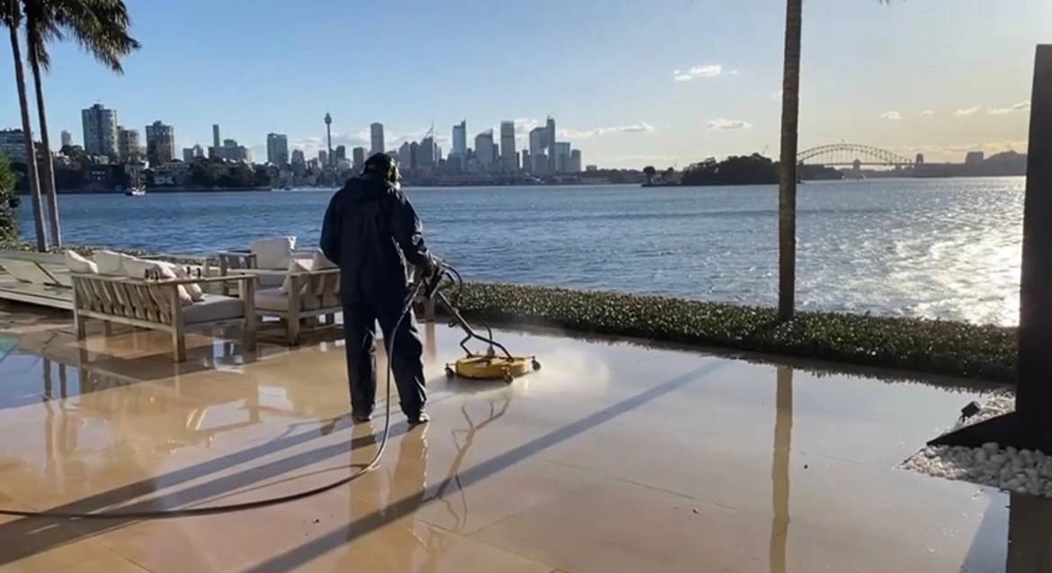Backyard surface cleaning overlooking the sydney harbour.