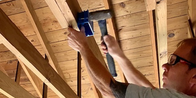 Repairing a house for renovation. Wooden beams to support the structure of the house.