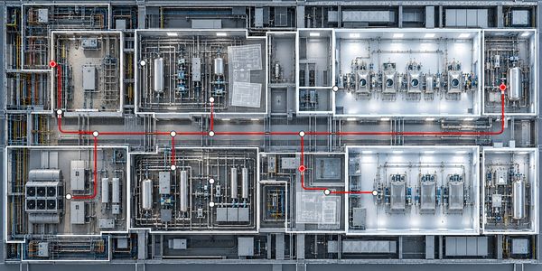Top-down view of a complex industrial pipeline and machinery layout.