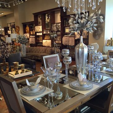 Home decor boutique displaying furniture and table settings