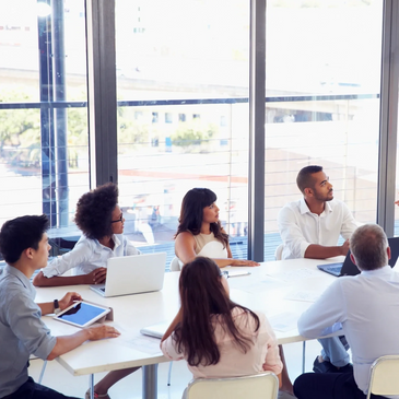 People sitting at a conference table.  RODBT. PACT. Brainspotting. Group therapy. Austin and Texas.