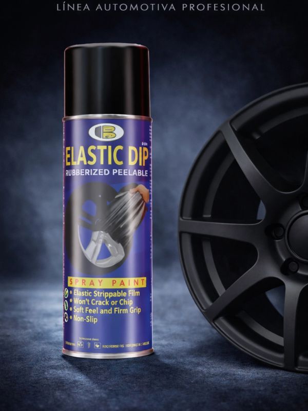 Lata de pintura en spray Elastic Dip junto a una rueda de automóvil.
