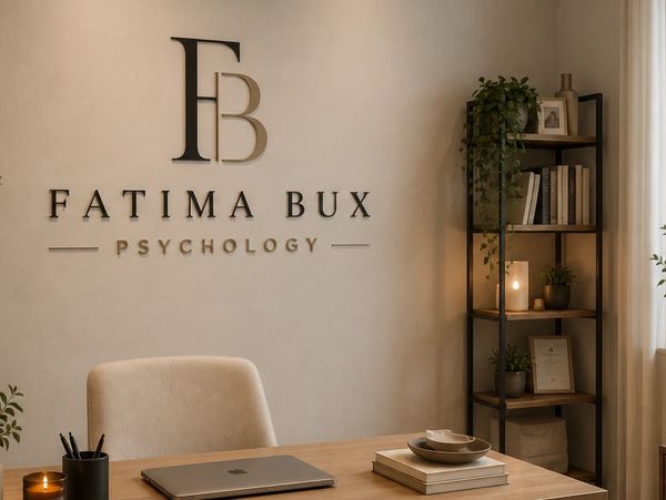 Cozy psychology office with minimalist design and warm lighting.