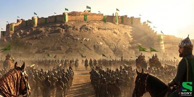 Medieval army gathers before a fortified hilltop castle at sunrise.