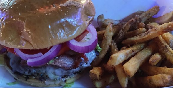 Bacon Cheeseburger with onion, tomato, garlic aioli and a side of french fries