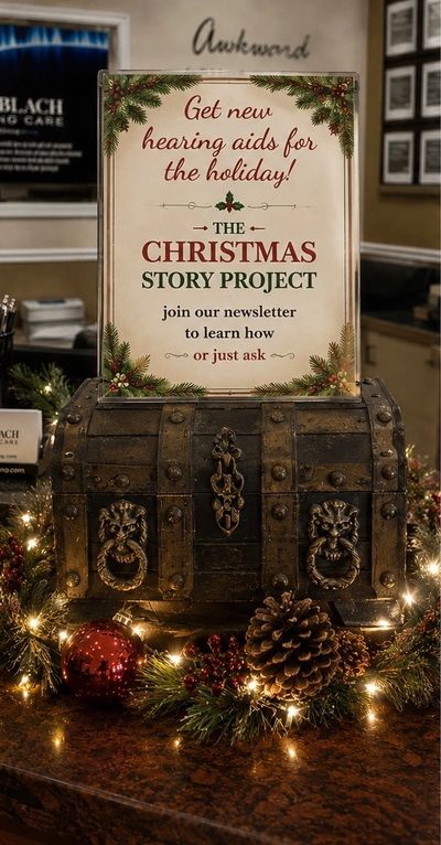 Holiday sign promoting new hearing aids and Christmas story project.