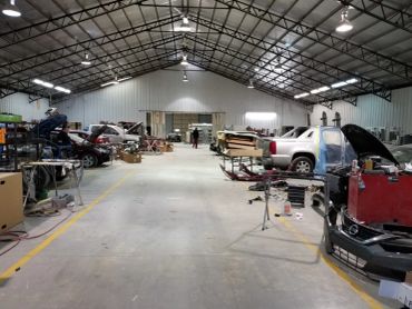 Inside view of a large auto repair shop.