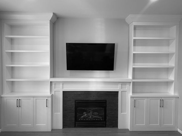 Custom built-in, cabinet painting, custom cabinets, custom fireplace