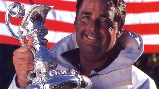 World Class skipper and speaker Dennis Conner with the America's Cup. 