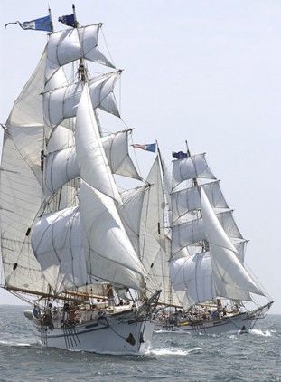 Twin brigantines tall ships sail off Long Beach, CA. 