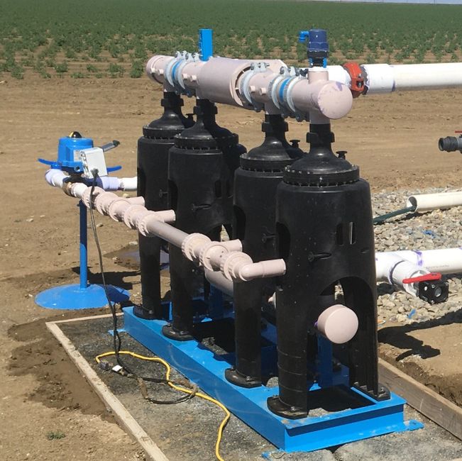 Custom engineered commercial sand filtration skid for pump protection and industrial cooling towers.