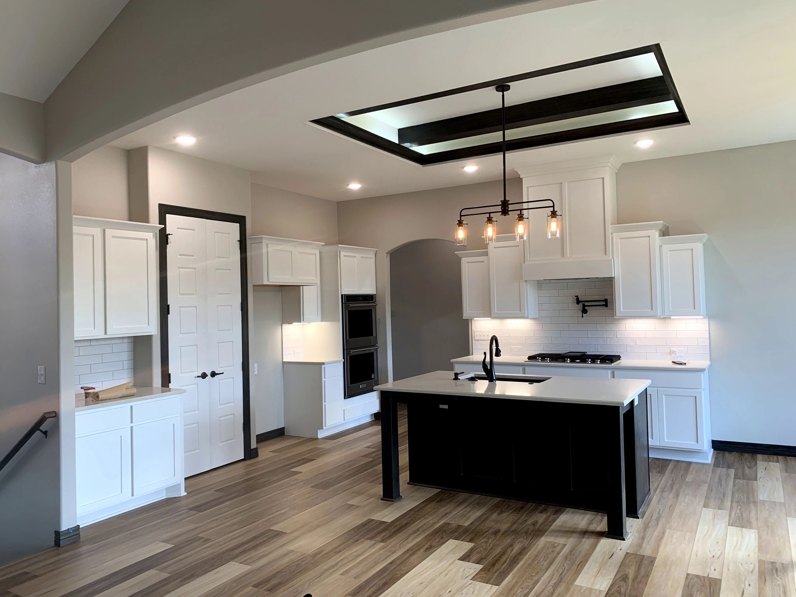 A space with painted cabinets, walls, trim, and ceilings by our interior painters in Wichita, KS, 
