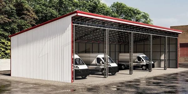A metal carport sheltering three white vans in an outdoor setting.