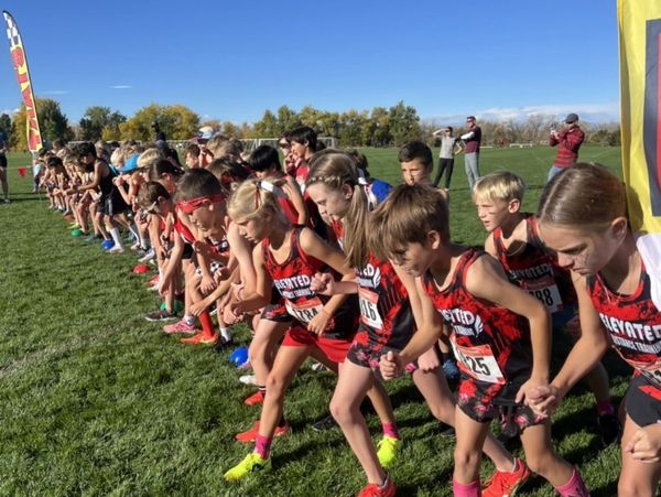 Athletes start a cross country race in Aurora, Colorado