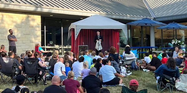 Anthony Stockton Magician preforms magic at a local library event for the kids in Crest Hill, Il