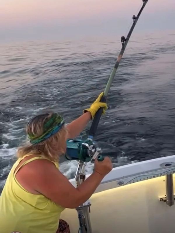 Nancy Marciano fighting a giant bluefin tuna on the hard merchandise 