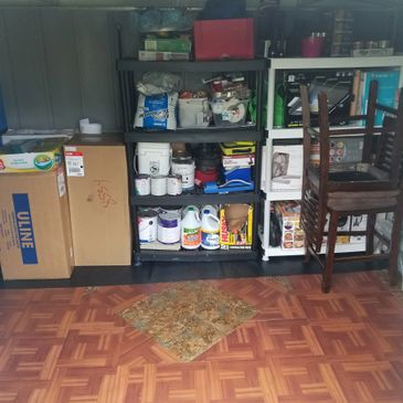 Clean & Organized with vinyl flooring done by Royalty Garages....