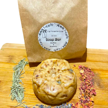 Natural handmade soap bar with herbal ingredients and eco-friendly packaging.