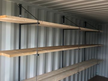 Racking or shelving inside storage box