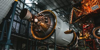A detailed view of a space module inside a museum exhibit.