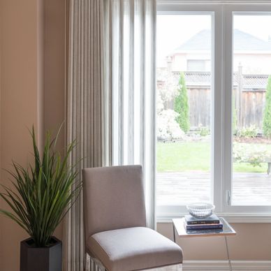 Privacy sheers offer style & versatility. Vertical design. Livingroom window, with light control. 