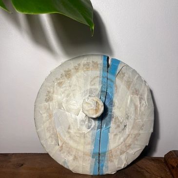 Disque ancien réparé avec du ruban adhésif.